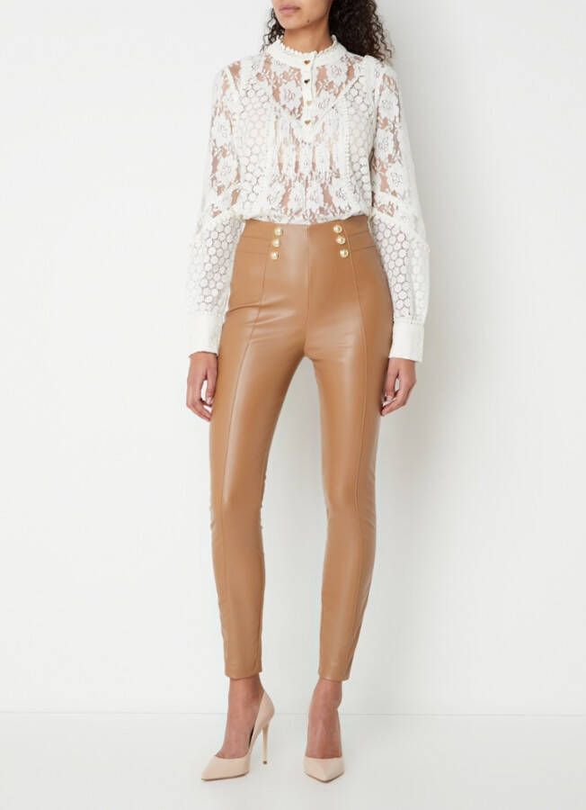 NIKKIE Kitty semi transparante top van kant met opstaande kraag